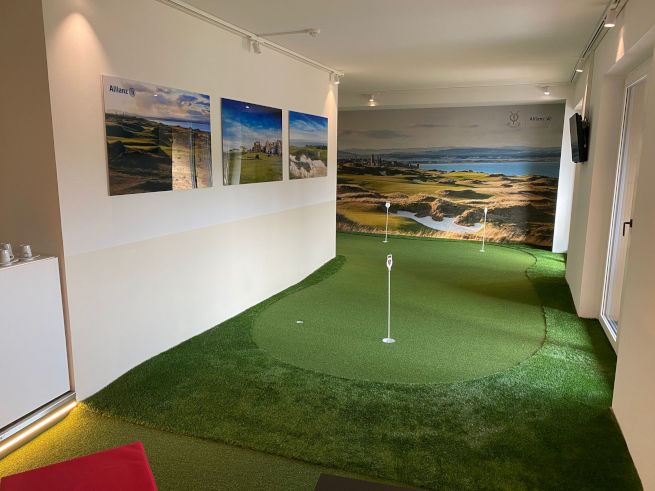 Kennewick indoor putting green in an office with scenic wall art